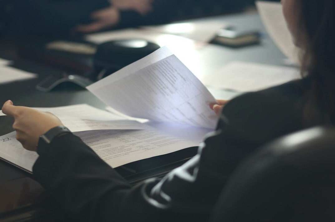 woman reviewing documents
