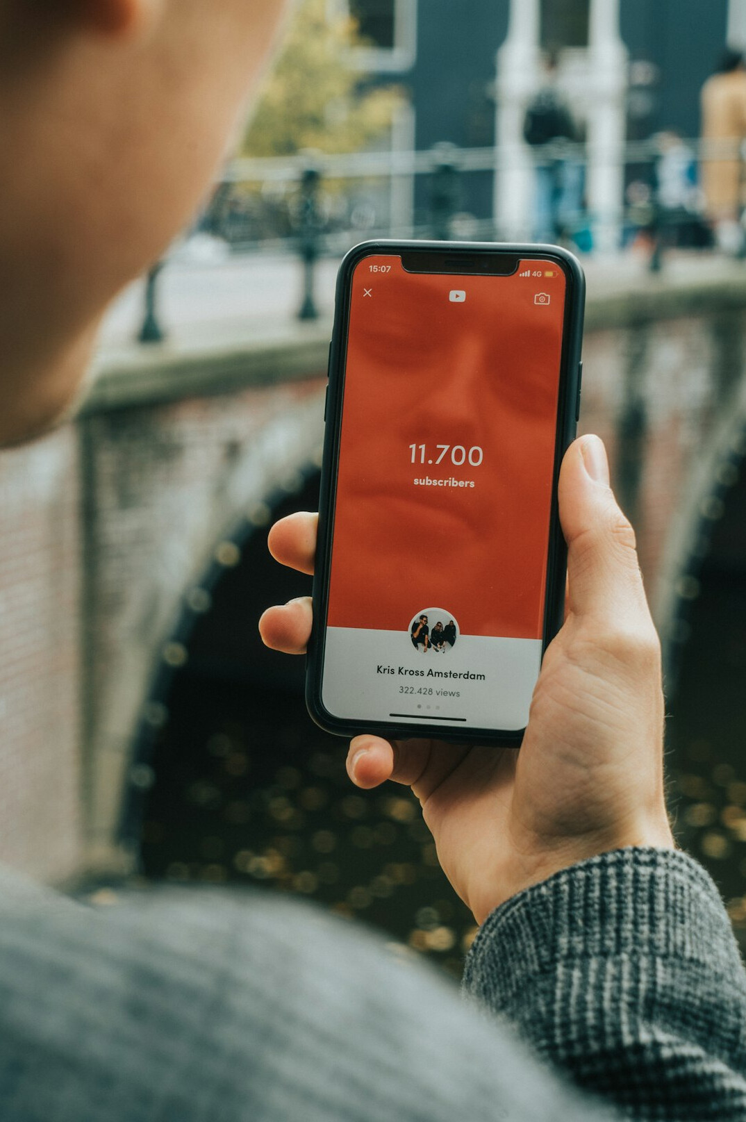 person checking phone discreetly